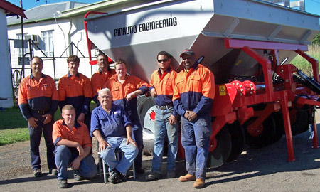 rinaudo engineering team posing in front of stool splitter